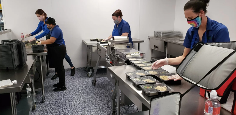 Staff preparing our meals in commercial kitchen