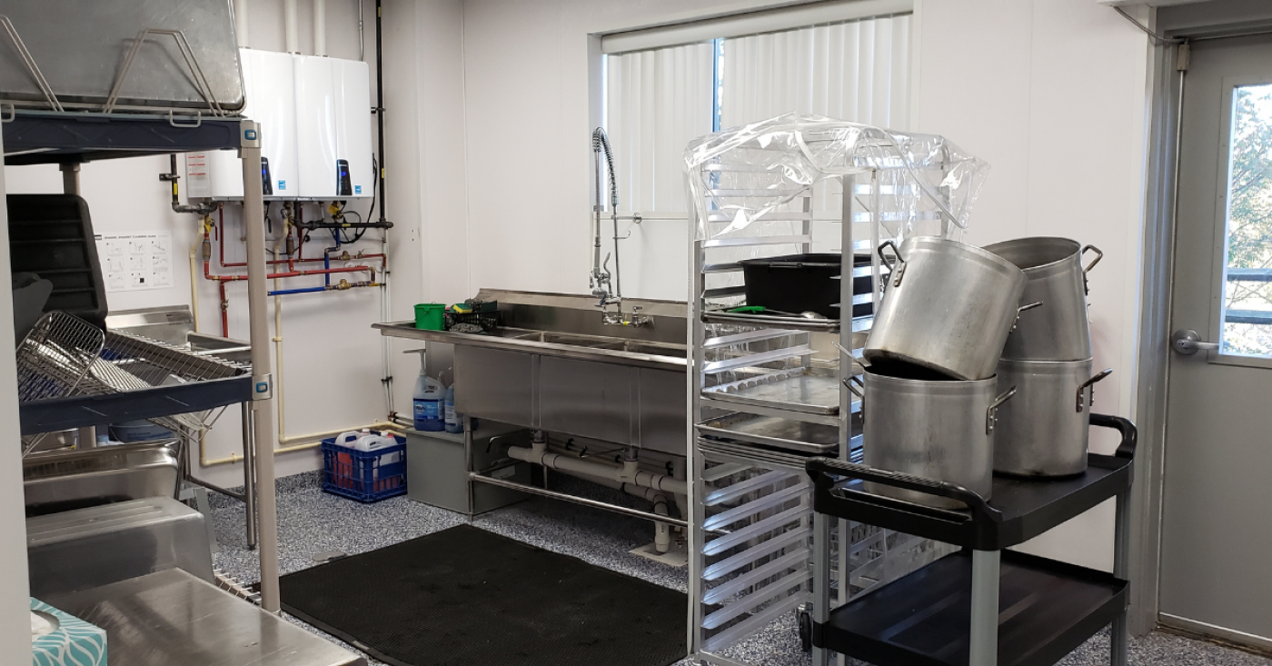 Wash area with sink and drying racks
