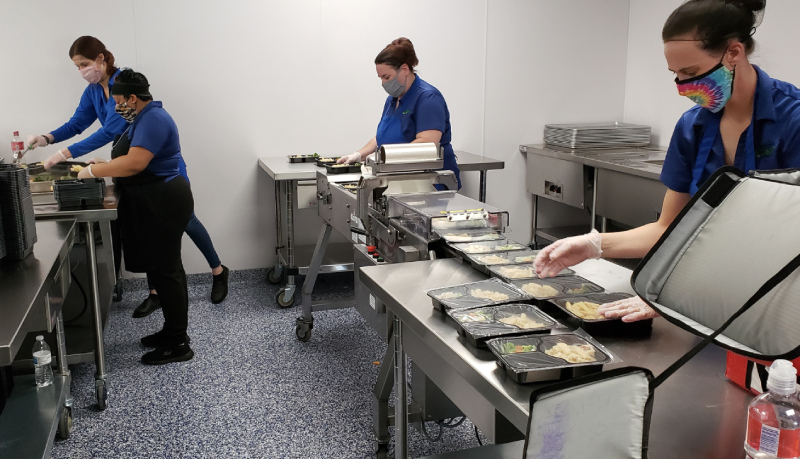 50th Anniversary look: Commercial kitchen meal packing prep area