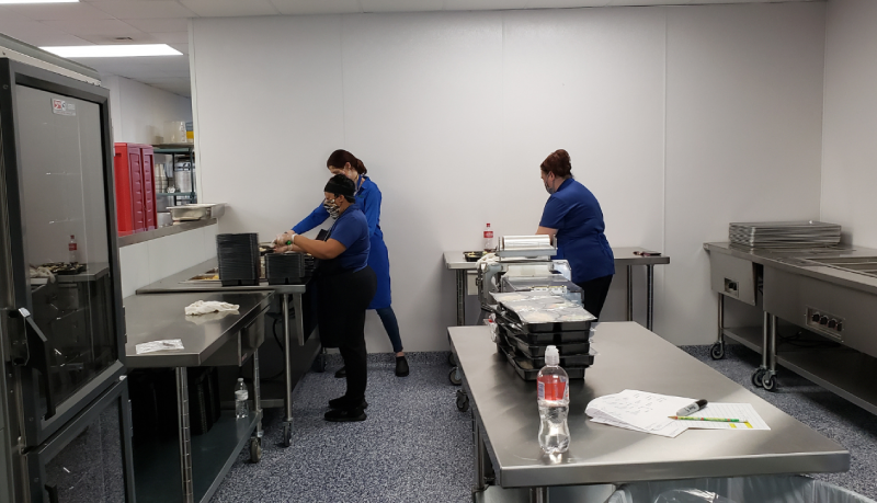 50th Anniversary look: Commercial kitchen meal packing prep area