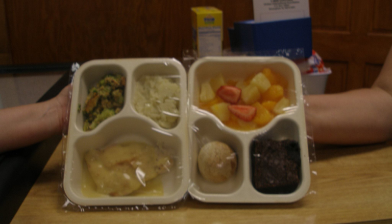 Full food trays sealed with a clear wrap